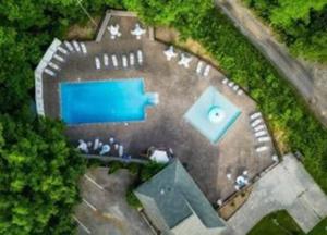 an aerial view of a swimming pool in a park at VIEWS and FIREPLACE and Minutes to Gburg and Ober in Gatlinburg