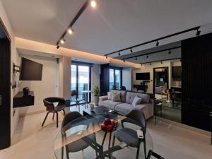 Χώρος καθιστικού στο Raam Luxury Suites