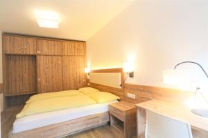 Posteľ alebo postele v izbe v ubytovaní Residence Tantalus