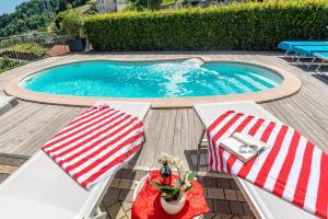 Fotografia z galérie ubytovania Piccola Orchidea Piccola Orchidea Giardino Ferienwohnung mit Pool v destinácii Musso