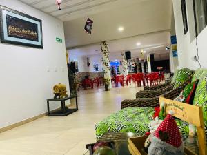 Posezení v ubytování Hotel Caribe La Vega