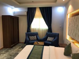 Χώρος καθιστικού στο Quel Serviced Units