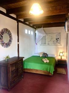 Voodi või voodid majutusasutuse Hostal Los Orishas toas