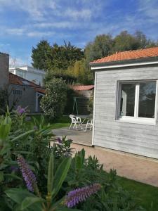 Vonkajšia záhrada v ubytovaní Maison de vacances vue mer