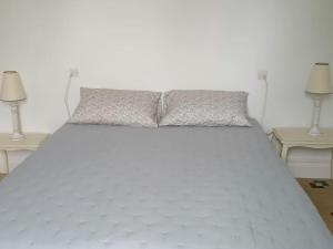 Posteľ alebo postele v izbe v ubytovaní Maison de vacances vue mer
