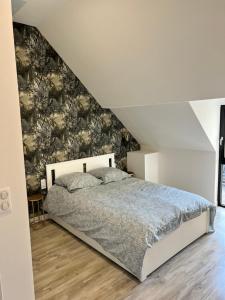 Postel nebo postele na pokoji v ubytování Le Loft Jacuzzi