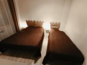 Postel nebo postele na pokoji v ubytování Résidence Consuegra