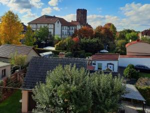 an aerial view of a city with buildings and trees at Ferienwohnung Gartenblick in Wildau