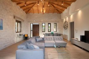 Posezení v ubytování Montes Albi Villa - Your Familly Destination