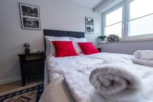 Posteľ alebo postele v izbe v ubytovaní Apartament Wilaneska