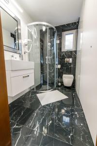 Kúpeľňa v ubytovaní Apartament Wilaneska