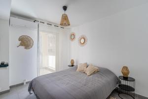 Posteľ alebo postele v izbe v ubytovaní Panier, Major, appartement de 47 m2, parking et terrasse