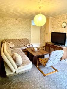 TV a/nebo společenská místnost v ubytování Airport Sarajevo Apartment 1