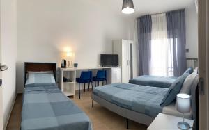 Postel nebo postele na pokoji v ubytování Dolce Hogar Residence