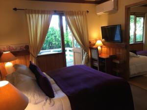 Ein Bett oder Betten in einem Zimmer der Unterkunft Merken Bed & Breakfast