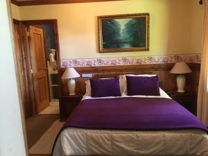 Ein Bett oder Betten in einem Zimmer der Unterkunft Merken Bed & Breakfast