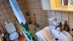 a bathroom with a sink and a toilet at B&B Candalla in Camaiore +101 photos