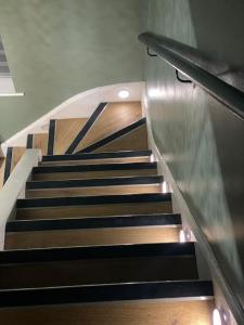 a set of stairs in a building at Ideal Abode Greenfields in Chester