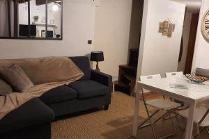 Posezení v ubytování Duplex cocooning avec vue lac et montagnes