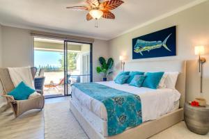 a bedroom with a bed with a view of the ocean at K B M Resorts- KGV-17T5 Remodeled 1Bdrm villa extra-large balcony sweeping ocean views in Kapalua