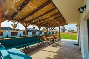 Balkón nebo terasa v ubytování Pensiunea Căsuța cu Stuf