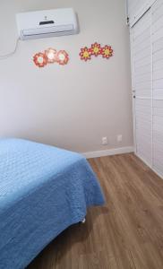 Ένα ή περισσότερα κρεβάτια σε δωμάτιο στο Apartamento Pe na Areia - Meia praia - Itapema Sc