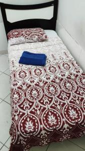 Cama ou camas em um quarto em Hostel da Floresta