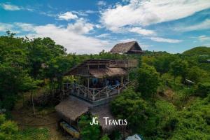 an aerial view of a house in the forest at Arapal Nature Retreat in Bogo