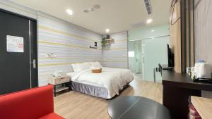 Voodi või voodid majutusasutuse Twelve Constellation Garden Resort toas