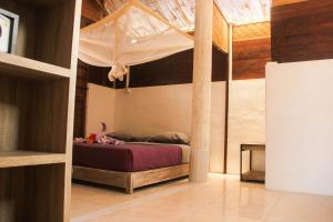 Postel nebo postele na pokoji v ubytování Seabreeze Hostel Bali