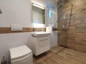 Kúpeľňa v ubytovaní Apartamenty Motyl - pokój studio