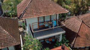 an aerial view of a house with red roofs at Ecozy Dijiwa Canggu in Canggu