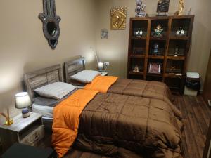 Postel nebo postele na pokoji v ubytování Lotus Guest House Malta