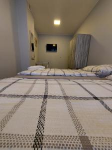 Llit o llits en una habitació de Hostel Centrum-Kamienica 1924
