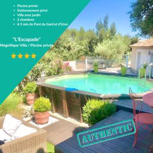 Bazén v ubytovaní L'Escapade, Magnifique Villa avec Piscine alebo v jeho blízkosti