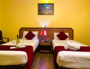 Krevet ili kreveti u jedinici u okviru objekta Thamel Grand Hotel