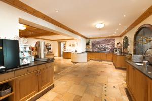 A kitchen or kitchenette at Hotel Tauernhof