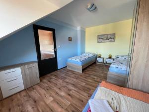 Posteľ alebo postele v izbe v ubytovaní Apartments Ubytování U Zemanů