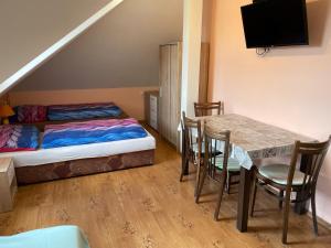 Posteľ alebo postele v izbe v ubytovaní Apartments Ubytování U Zemanů