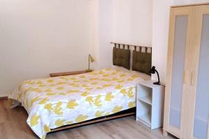 Un pat sau paturi într-o cameră la Bilocale nel cuore di Genova