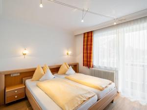 Postel nebo postele na pokoji v ubytování Apartment Weberbauer-2 by Interhome