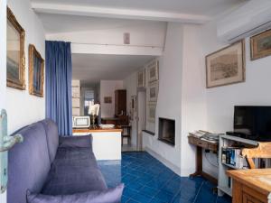 TV a/nebo společenská místnost v ubytování Apartment Lo Scuopolo by Interhome + 22 fotografií