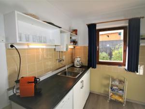 Kuchyň nebo kuchyňský kout v ubytování Chalet Amberg by Interhome