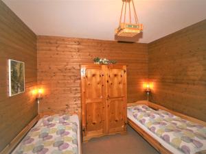 Postel nebo postele na pokoji v ubytování Chalet Amberg by Interhome