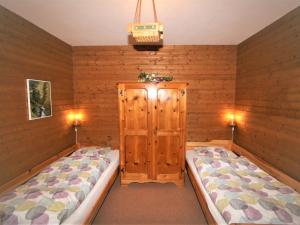 Postel nebo postele na pokoji v ubytování Chalet Amberg by Interhome