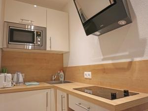 Kuchyňa alebo kuchynka v ubytovaní Apartment Alpengruss by Interhome