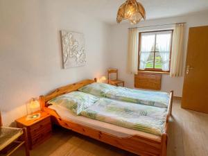 מיטה או מיטות בחדר ב-Apartment Janik by Interhome