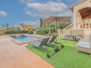 The swimming pool at or close to Holiday Home Cala Pi - CPI130 by Interhome