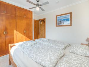 A bed or beds in a room at Holiday Home Cala Pi - CPI130 by Interhome