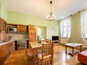 Kuchyň nebo kuchyňský kout v ubytování Apartment Base Camp 2